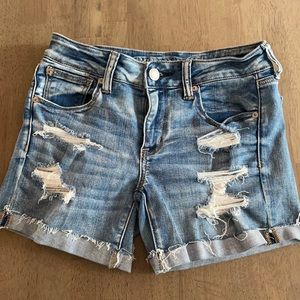 American Eagle jean shorts. Distressed with lace.